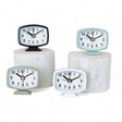 Small metal footed alarm clock in 4 colors, retro style with battery included