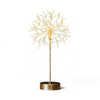  Mini freestanding dandelion light with 120 warm white LEDs, available in silver or gold, measuring 11 inches tall.
