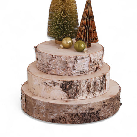three natural birch wood slice display risers with bark edges
