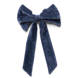 Navy cotton velvet decorative clip-on bow measuring 8 inches wide by 13 inches high.
