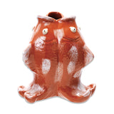 Stoneware koi fish shaped vase with orange and white reactive glaze