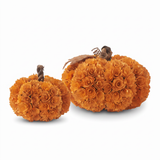 Orange shaved wood decorative pumpkins made from layered wood chips in two sizes for fall home decor.