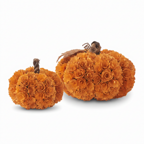 Orange shaved wood decorative pumpkins made from layered wood chips in two sizes for fall home decor.