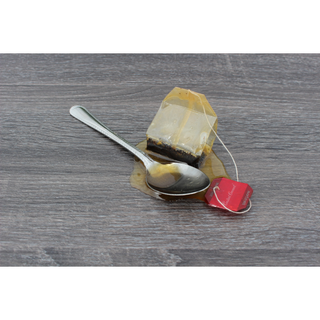 Fake Spilled Tea with Spoon and Tea Bag