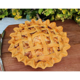 Apple pie with glazed apple filling and detailed lattice crust