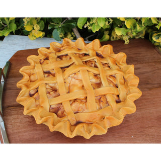 Apple pie with glazed apple filling and detailed lattice crust