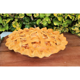 Apple pie with glazed apple filling and detailed lattice crust