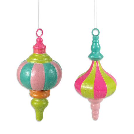 Two oversized metal finial ornaments with glitter, featuring pink, turquoise, and lime green stripes and hanging cords