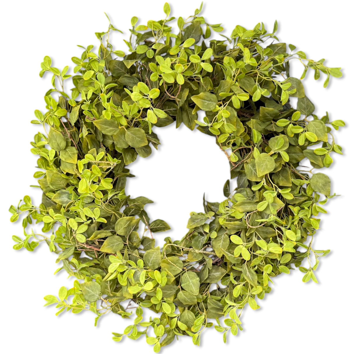 Oversized mixed foliage wreath with realistic green leaves and twig accents, 30 inches in diameter.