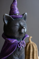 Two-foot black cat Halloween figurine with purple hat and cape