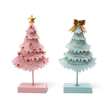 Pink metal Christmas tree with a gold star and red details beside a mint tree with a gold bow, both on matching rectangular bases.