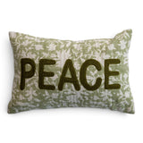 Green and natural floral lumbar pillow with raised olive-green PEACE lettering and hand-embroidered Kantha stitching
