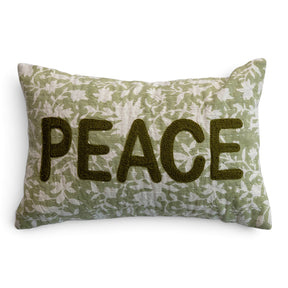 Green and natural floral lumbar pillow with raised olive-green PEACE lettering and hand-embroidered Kantha stitching
