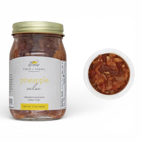 sweet and spicy pineapple salsa jar for tacos grilled chicken and chips