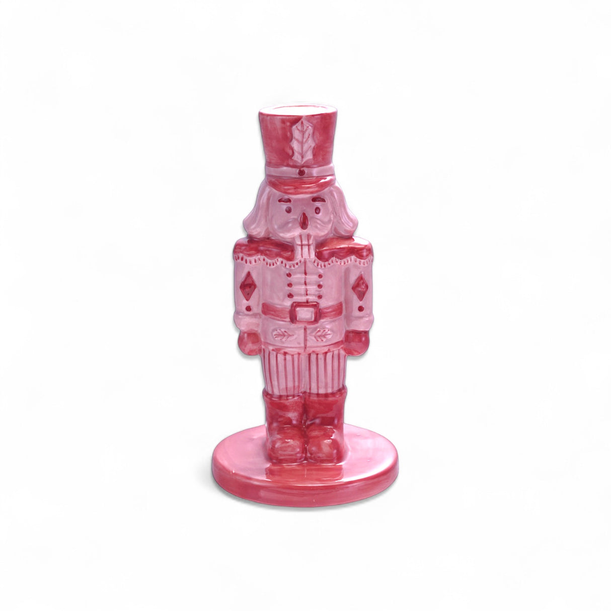 Pink and red stoneware nutcracker taper candle holder with sugared finish
