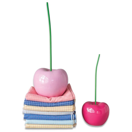Glossy pink resin cherry decor accents with green stems in two sizes for colorful modern home styling