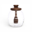 glass honey jar with acacia wood lid and honey dipper