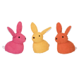 Plush bright crouching bunny doorstop in three colors, perfect for home décor and kids' rooms.