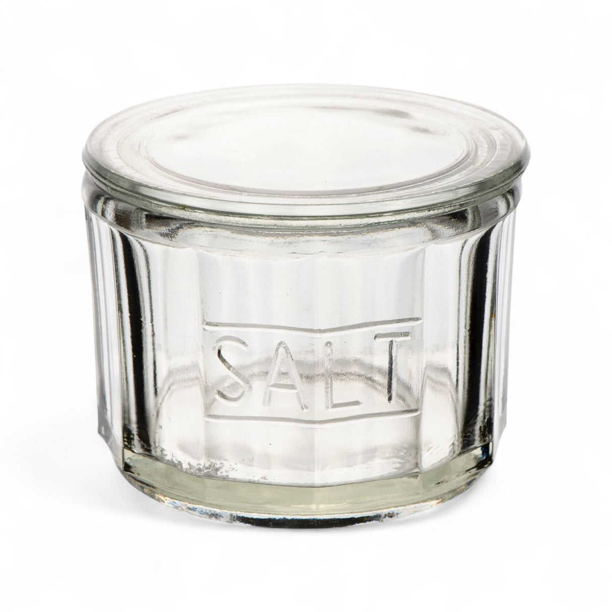 Clear pressed glass salt cellar with lid and embossed SALT lettering, 4.5 by 3.5 inches