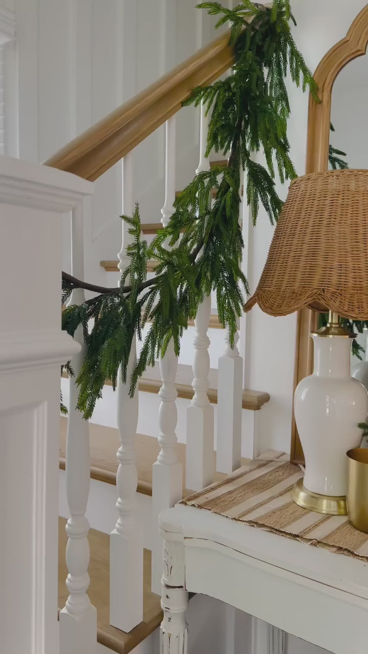 natural touch norfolk pine on staircase