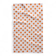 Tea towel with orange pumpkin pattern on a white background