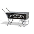 Black metal decorative wheelbarrow with “Pumpkin Pie Company” text for farmhouse fall décor