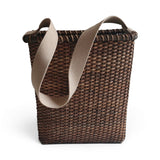 Handwoven rattan wall basket with strap for front door floral arrangements and seasonal home décor
