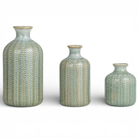 set of 3 embossed ceramic bud vases with reactive glaze in soft grey tones