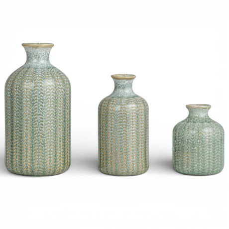 set of 3 embossed ceramic bud vases with reactive glaze in soft grey tones