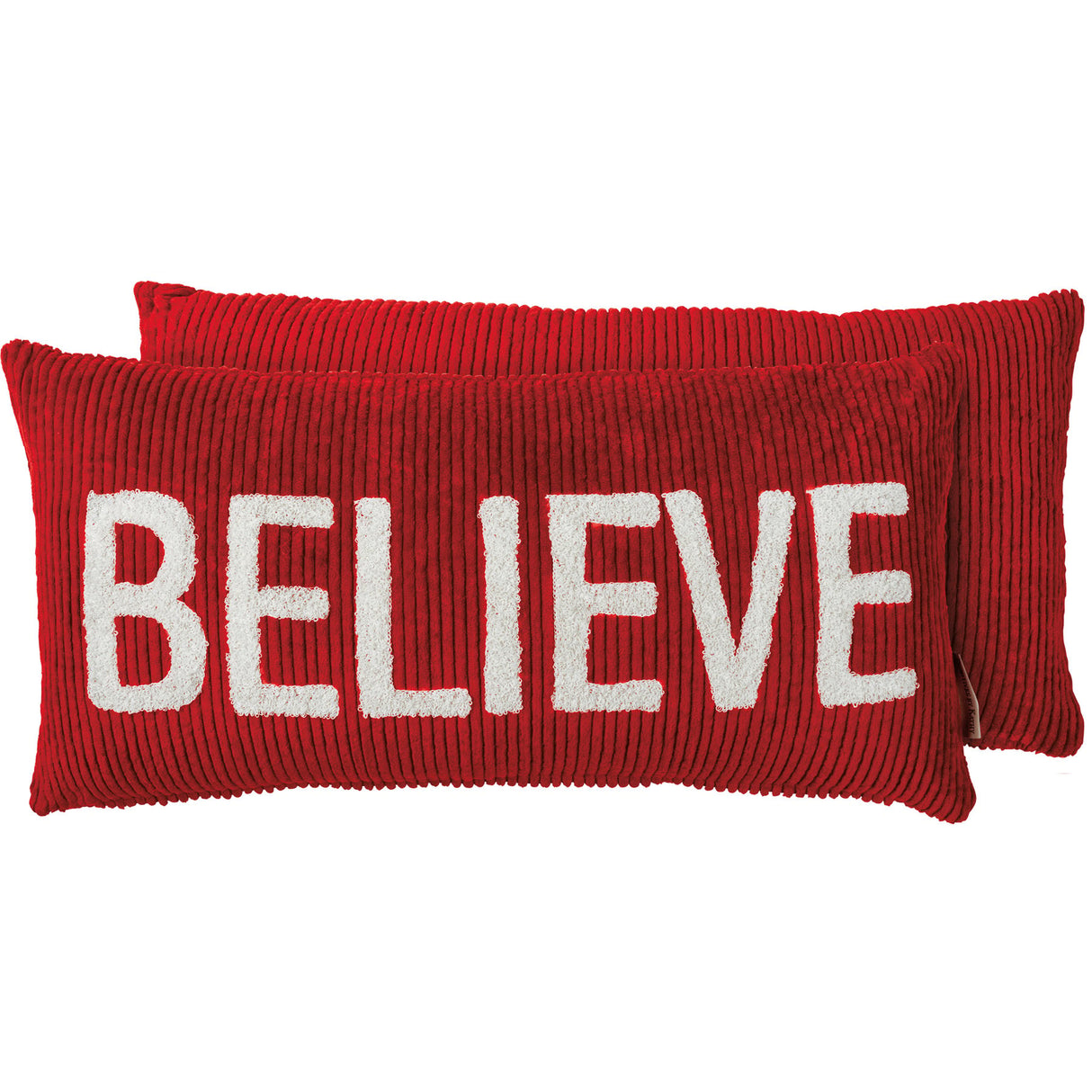 red corduroy pillow that says believe for Christmas