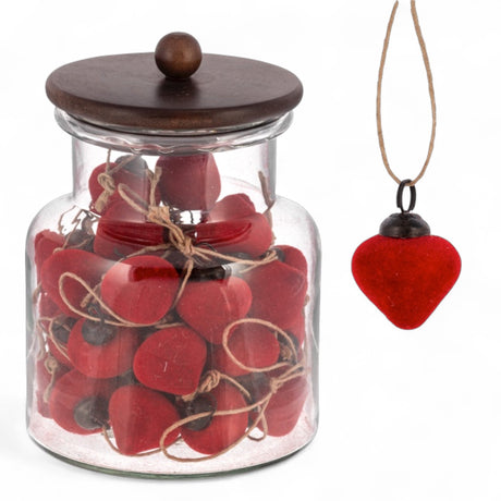 Red flocked heart-shaped ornament with twine hanger,