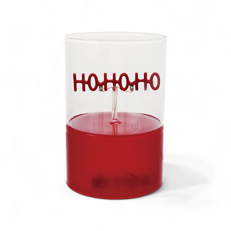 Red glass LED light with “HO HO HO” shaped filament, 4" round x 4.75" high