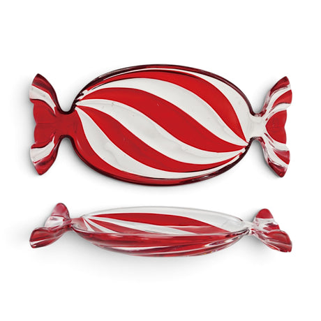 Top and side views of a candy-shaped glass dish with swirling red stripes, clear accents, and sculpted wrapper ends