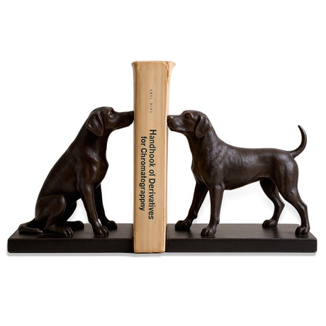 Set of two black resin dog bookends, including one sitting and one standing dog, with a sleek black finish