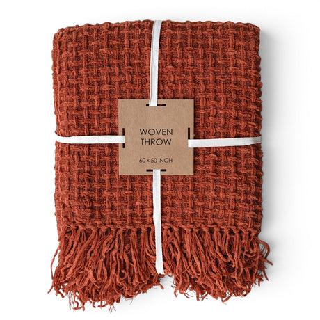 Rust chenille waffle weave throw blanket with knotted fringe
