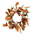 Rust and tan leaves candle ring, 7-inch outer diameter, perfect for pillar candles or autumn décor.