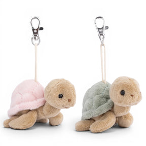 Bukowski Bears Sandy turtle plush bag charm available in pink and sage green shell colors with clip attachment