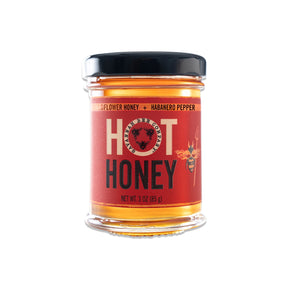 Savannah Bee Company hot honey with habanero peppers wildflower honey sweet and spicy condiment for pizza chicken and cocktails
