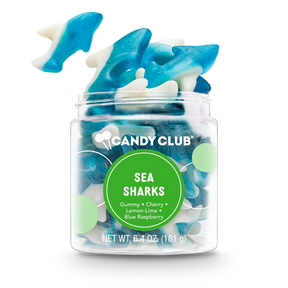 Sea Sharks gummy candy in a clear small cup featuring blue and white shark-shaped gummies, 6.4 oz net weight