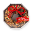 Round 9-inch bird feeding wreath made from solid seed, nuts, and fruit, presented in a shrink-wrapped tray.