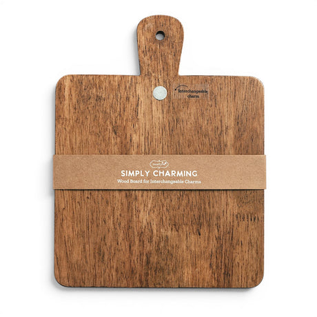 Simply Charming wooden paddle serving board with magnetic disc for interchangeable seasonal charms
