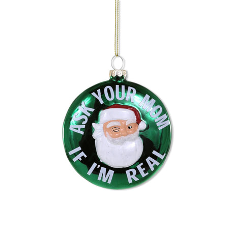 Green glass ornament with winking Santa face and “Ask Your Mom If I’m Real”
