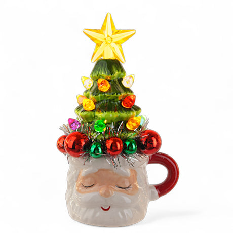Small LED Santa mug with tree figurine lights up 5 inches