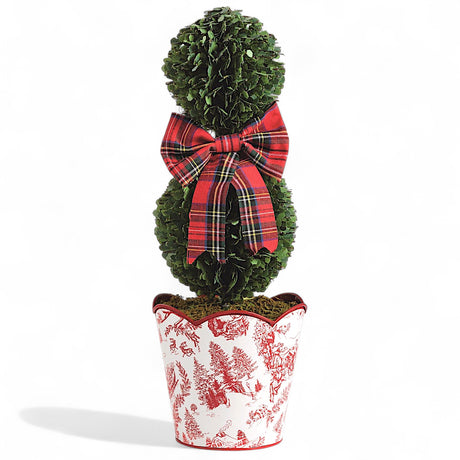 Small snowman-shaped boxwood topiary with tartan bow in toile tin pot