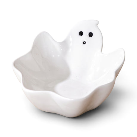 Small white ceramic ghost bowl with black facial details for Halloween candy and décor