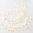 Snowberry plug-in decorative lights with 200 warm white LEDs for indoor and outdoor holiday displays.