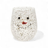 Clear confetti glass stemless wine glass with snowman face and carrot nose design.