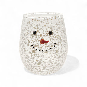 Clear confetti glass stemless wine glass with snowman face and carrot nose design.