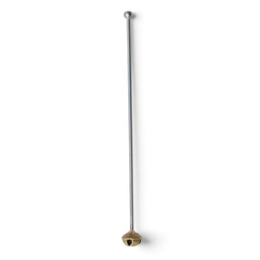Stainless steel cocktail stirrer with a textured brass bell at one end and a small rounded silver-tone tip at the other.