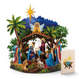 Starlit Nativity pop-up Christmas card with Mary, Joseph, baby Jesus, Wise Men, Bethlehem night sky, and gold Christmas star